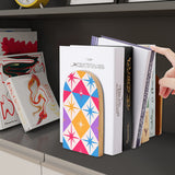 Star Diamonds retro wooden bookend on a dark shelf with books