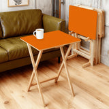 Burnt Orange retro TV tray set of 4, in a living room beside an olive sofa