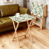 Chinoiserie Blossom retro TV tray set of 4, in a living room beside an olive sofa