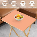 Apricot retro TV tray set of 4, tabletop close-up with fruit bowl
