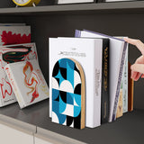 Blue Geometric retro wooden bookend on a dark shelf with books