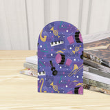 Close-up of the Jazz Music retro wooden bookend beside stacked magazines