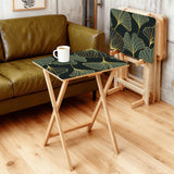 Gold Ginkgo retro TV tray set of 4, in a living room beside an olive sofa