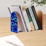 Blue Atomic Squares retro bookend holding books on a wooden desk next to a pen