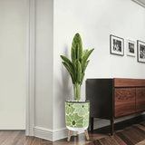 Floral 70s Retro Plant Pot with Wooden Legs: Green White Black Decor - retro plant pot
