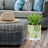 Floral 70s Retro Plant Pot with Wooden Legs: Green White Black Decor - retro plant pot