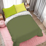 Olive green duvet cover set with lime pillowcases on a bed with a pink rug and gray curtains