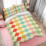 Harlequin duvet cover set on a bed with a pink rug and gray curtains