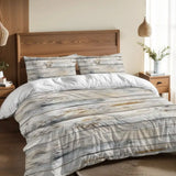 Rustic gray wood plank duvet cover set on a bed with a wooden headboard and a pendant lamp