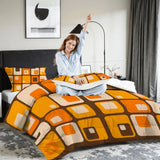 Woman stretching on a bed with the squares comforter set