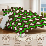 Close view of the diamond geometric comforter with care icons for breathable and machine washable
