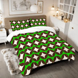Diamond geometric comforter set on a bed with a fur rug and a bedside lamp