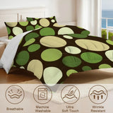 Close view of the polka dots comforter with care icons for breathable and machine washable