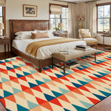 Bedroom with a wooden bed above a 9x12 ft area rug, red, teal and cream triangle rows