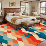 Bedroom with a wooden bed above a 9x12 ft area rug, orange, teal and cream zigzag diamonds