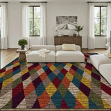 Living room with a cream sofa and a 9x12 ft area rug, burgundy, blue and mustard harlequin diamonds