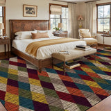 Bedroom with a wooden bed above a 9x12 ft area rug, burgundy, blue and mustard harlequin diamonds