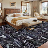 Retro dark academia black purple botanical large area rug 9x12 ft in a bedroom with a bed and bench