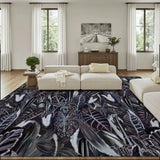 Retro dark academia black purple botanical large area rug 9x12 ft in a living room with a cream sofa