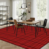Dining room with a wooden table and chairs on a 9x12 ft area rug, red and black plaid