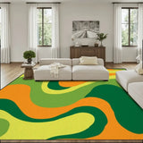 Living room with a cream sofa and a 9x12 ft area rug, wavy green, orange and lime swirls