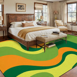 Bedroom with a wooden bed above a 9x12 ft area rug, wavy green, orange and lime swirls