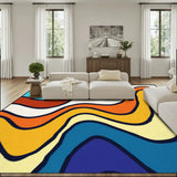 Living room with a cream sofa and a 9x12 ft area rug, wavy blue, orange and cream stripes