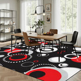 Dining room with a wooden table and chairs on a 9x12 ft area rug, black with red, white and gray circles