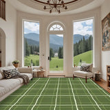 Living room with arched windows and a 9x12 ft area rug, green with a cream window-pane line grid