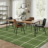 Dining room with a wooden table and chairs on a 9x12 ft area rug, green with a cream window-pane line grid