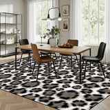 Retro snow leopard print large area rug 9x12 ft under a dining table with black chairs