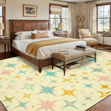 Bedroom with a wooden bed above a 9x12 ft area rug, cream with teal, orange and pink starbursts