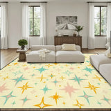 Living room with a cream sofa and a 9x12 ft area rug, cream with teal, orange and pink starbursts