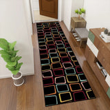 Retro black colorful squares hallway runner rug in a hallway with a potted plant