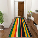 Retro striped hallway runner rug in green and yellow in a hallway with a wooden door