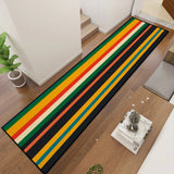 Retro striped hallway runner rug in green and yellow, top view in a hallway