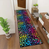 Colorful leopard runner rug in a narrow hallway beside a green plant and wooden console