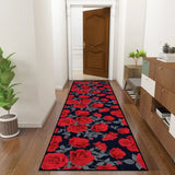 Retro dark floral red rose hallway runner rug in a hallway with a wooden door