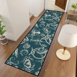 Retro teal nautical hallway runner rug in a hallway with a floor lamp