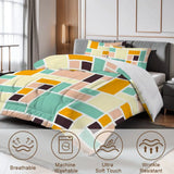 Close view of the color block comforter with care icons for breathable and machine washable