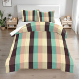 Queen comforter set with a plaid in mint, peach, cream and brown on a bed with two bedside tables