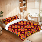 Flower power comforter set on a bed in a room with wooden shelves and a desk