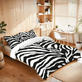 Zebra print comforter set on a bed in a room with wooden shelves and a desk