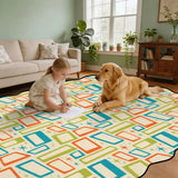 Child and golden retriever on cream teal and orange rectangle-pattern scalloped area rug