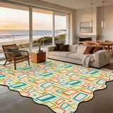 Cream teal and orange rectangle-pattern scalloped area rug 9x12 ft in a living room with beach view windows