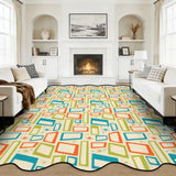 Cream teal and orange rectangle-pattern scalloped area rug in a living room with fireplace and white sofas