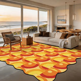 Orange and yellow circle-pattern scalloped area rug 9x12 ft in a living room with beach view windows