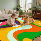 Child and golden retriever on rainbow swirl scalloped area rug