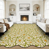 Olive green daisy-pattern scalloped area rug in a living room with fireplace and white sofas