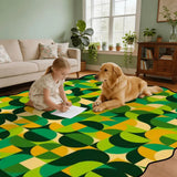 Child and a golden dog on a 9x12 ft green and yellow scalloped area rug in a living room